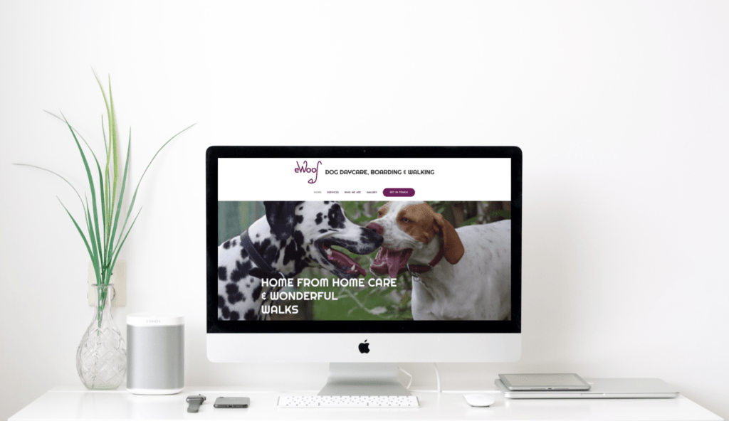 ewoof dog daycare wordpress website displayed on desktop, built by Beknowin